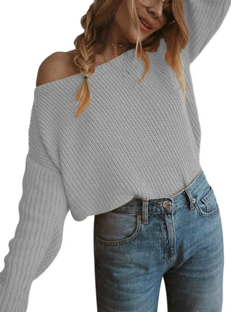 A LONG SLEEVED PULLOVER OPEN NECK SHOULDER